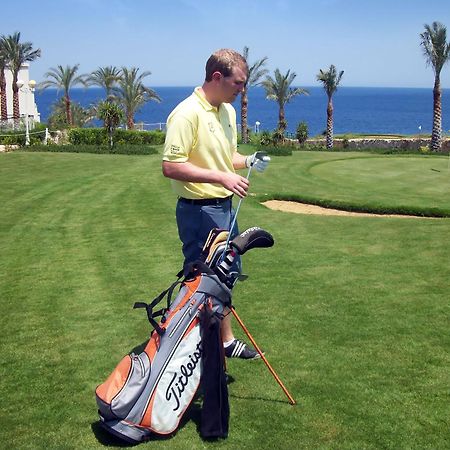 Stella Di Mare Beach Hotel & Spa Sharm el-Sheikh Bagian luar foto Golf player with a golf bag